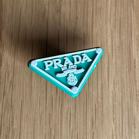 prada book charm|Prada phone charm.